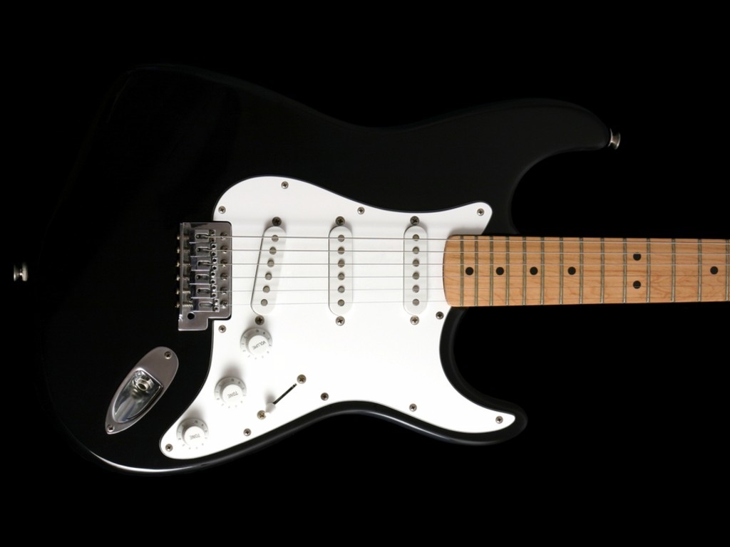 Black And White Electric Guitar On A Background