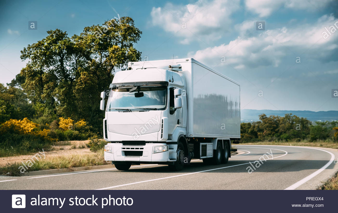 White Truck Or Traction Unit In Motion On Road Way Asphalt