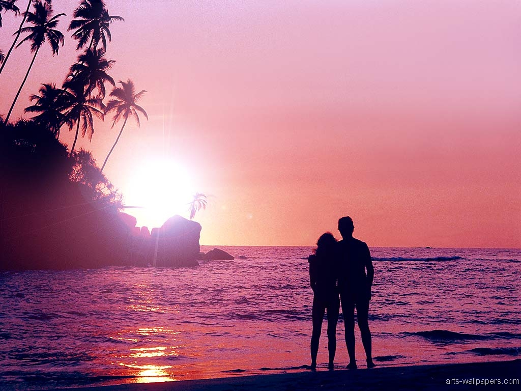 Couple On The Beach Wallpaper