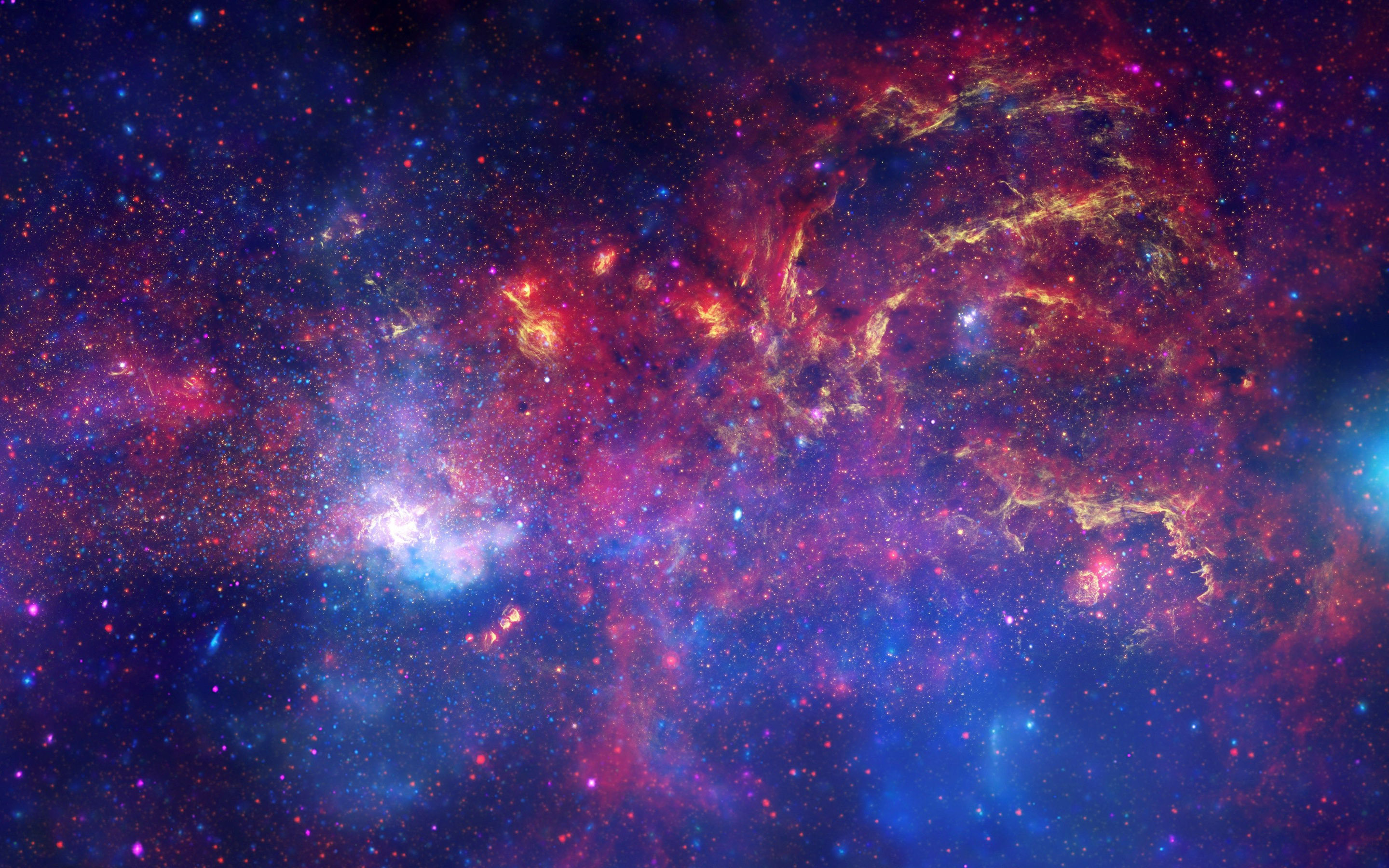 A breathtaking view of a vibrant galaxy, filled with swirling cosmic dust, glittering stars, and nebulae in shades of pink, purple, and gold