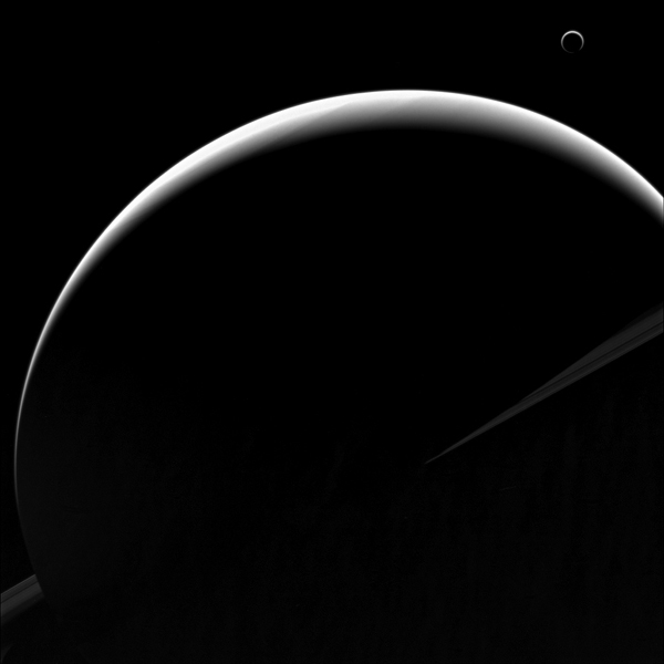 The From Nasa S Cassini Orbiter Shows Titan Crescent Nearly