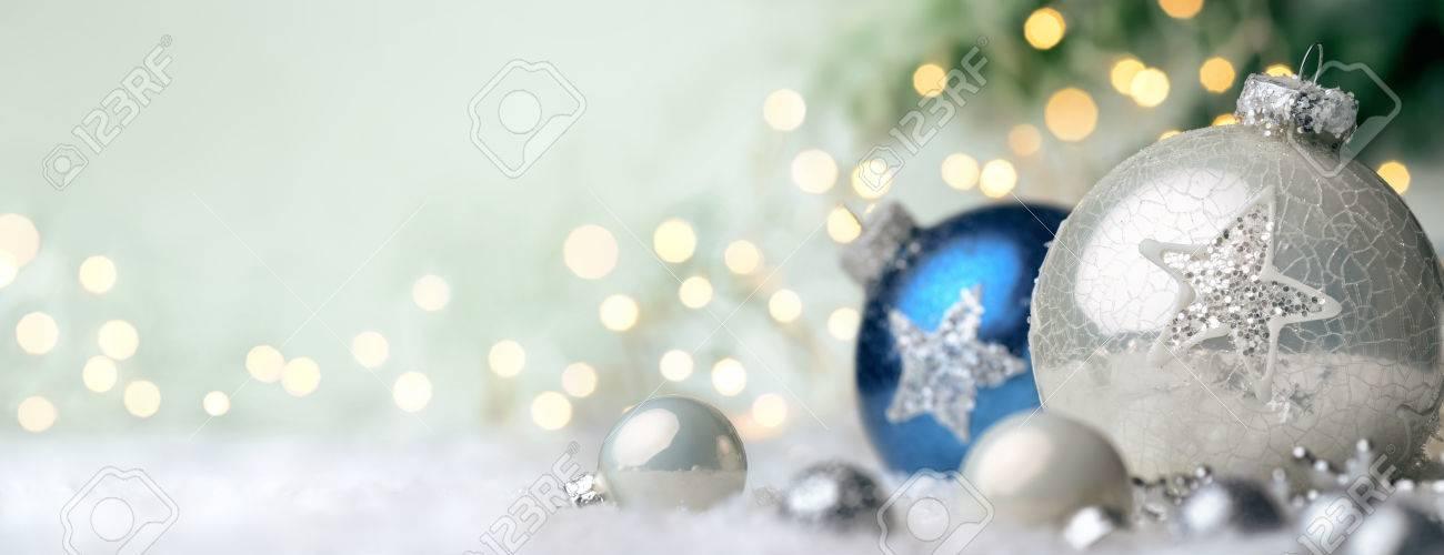 Panoramic Christmas Background With Nice Shiny Baubles On Snow And