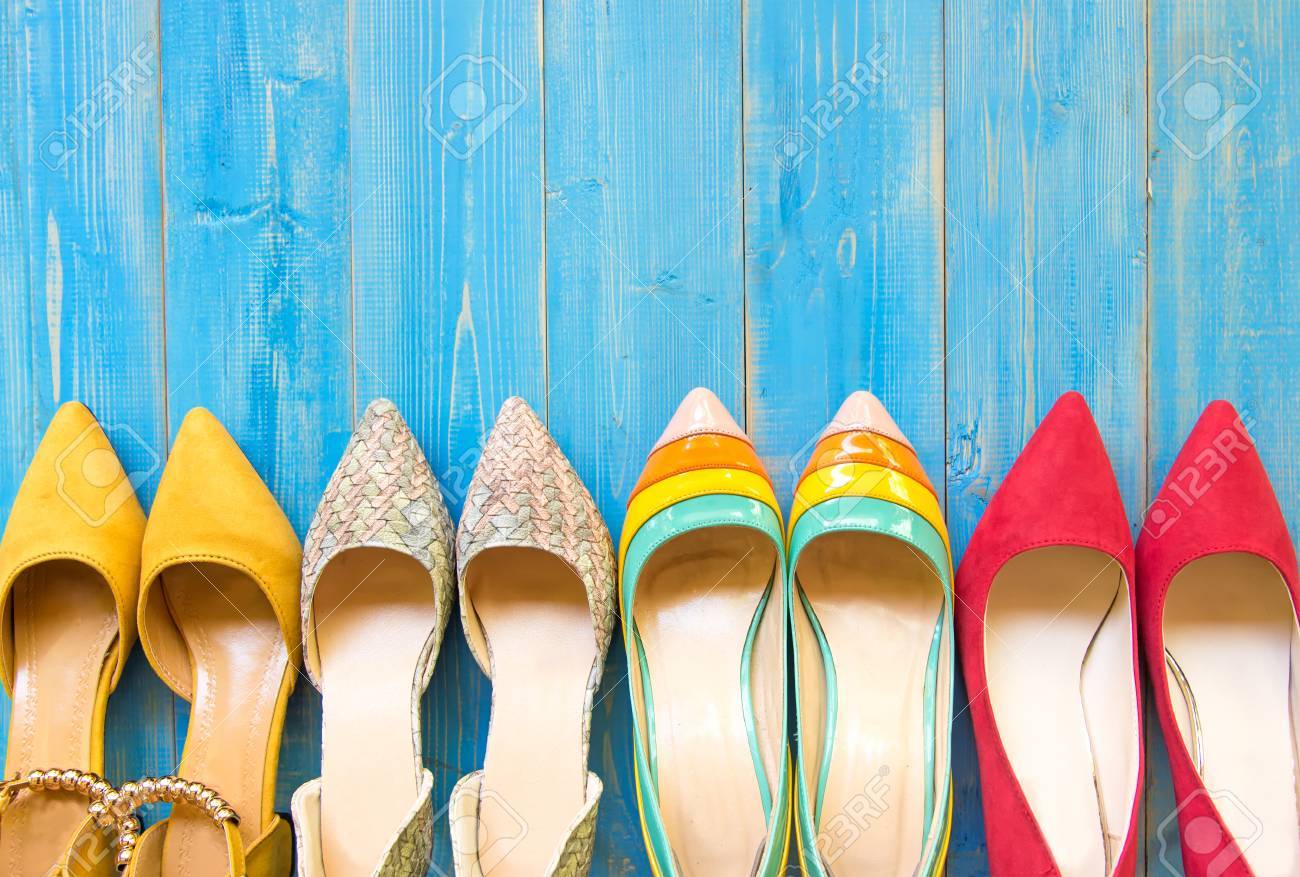 Collection Of Women S Shoes On Blue Background Stock Photo