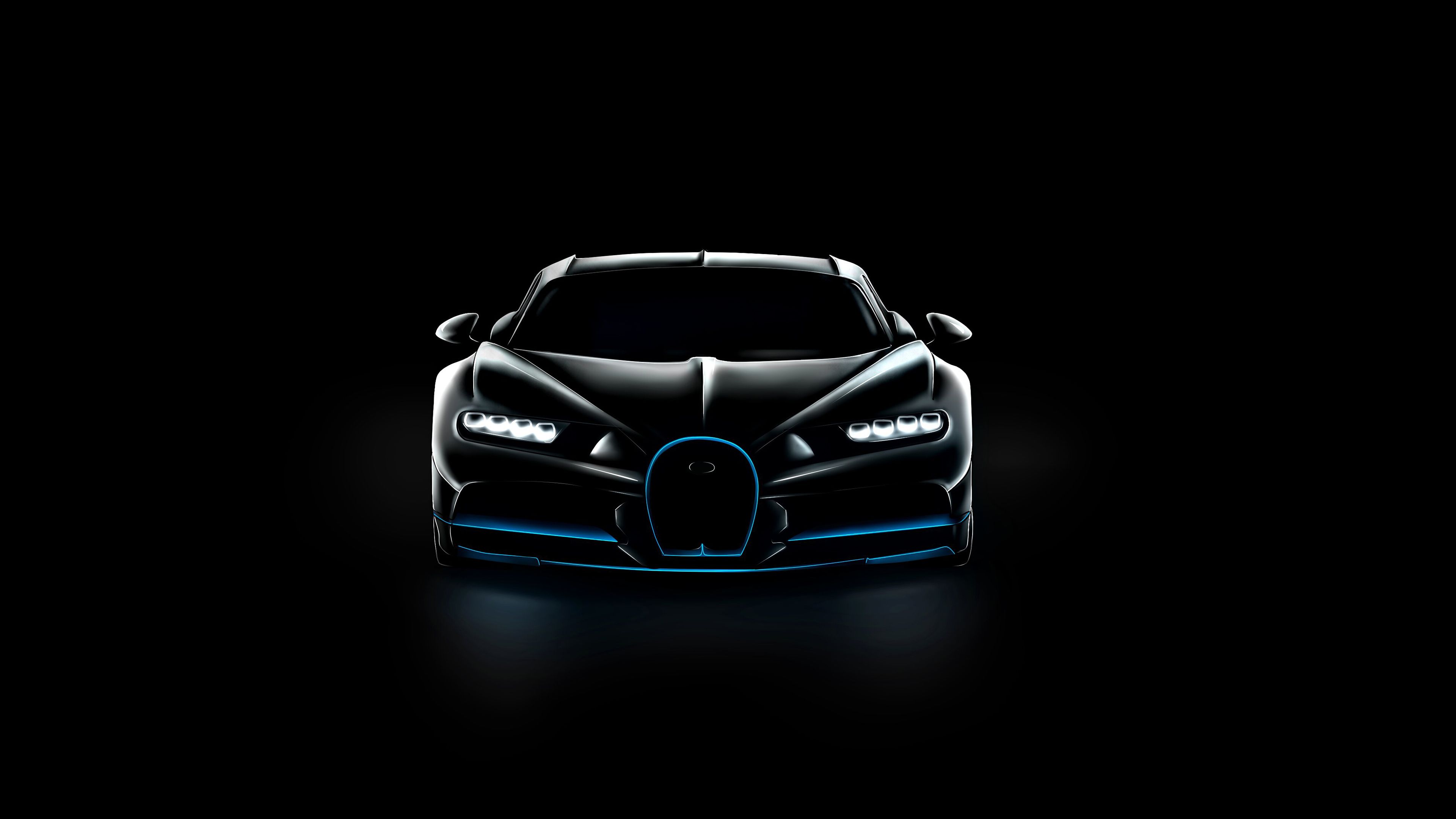Dark, sleek Bugatti hypercar against a black background, headlights glowing faintly