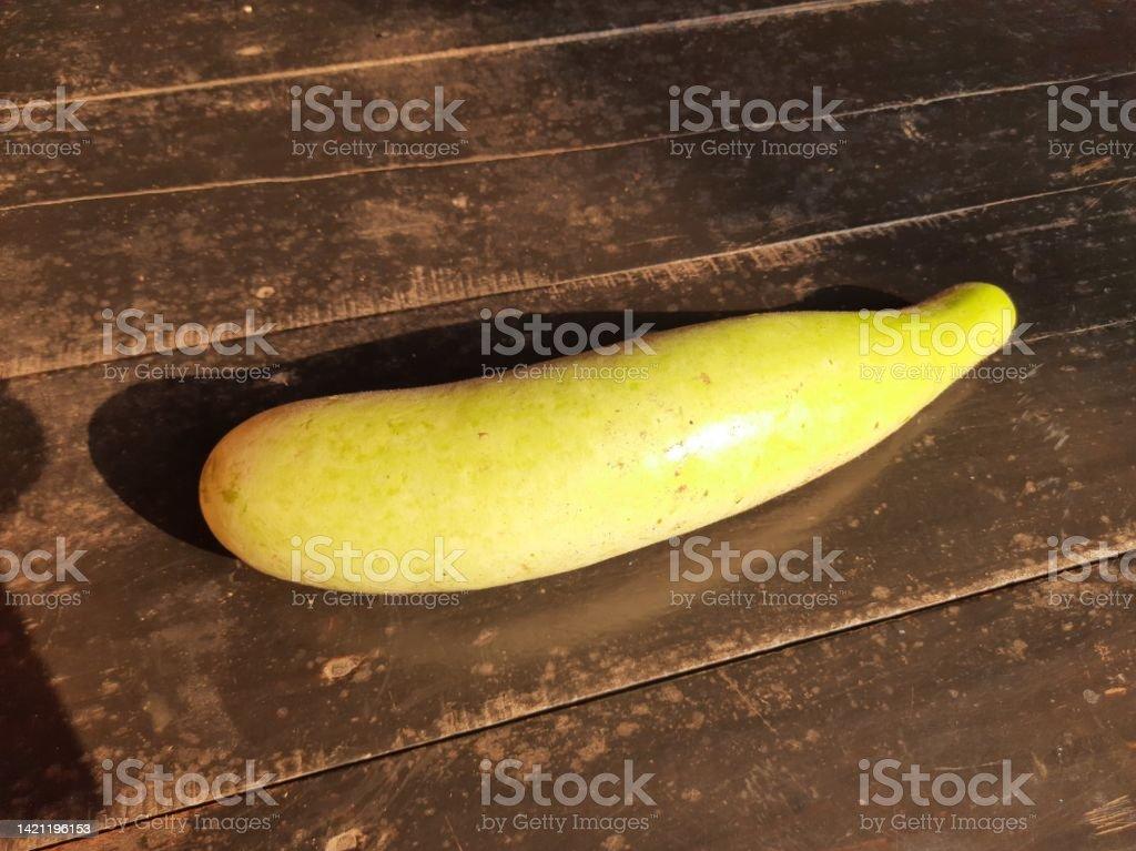 Bottle Gourd In Black Background Stock Photo Image Now