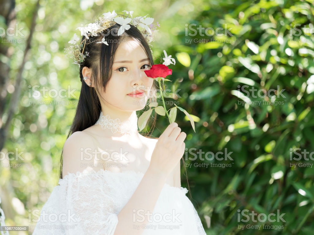 Beautiful Fairy Lady In A White Wedding Dress And