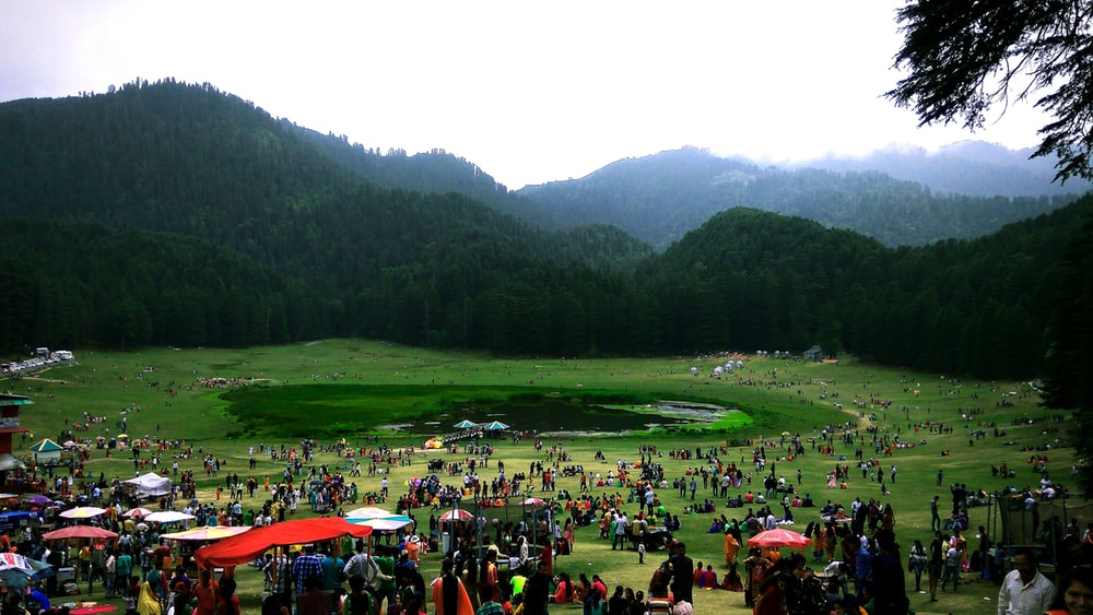 People On Green Grass Field During Daytime Photo Khajjiar