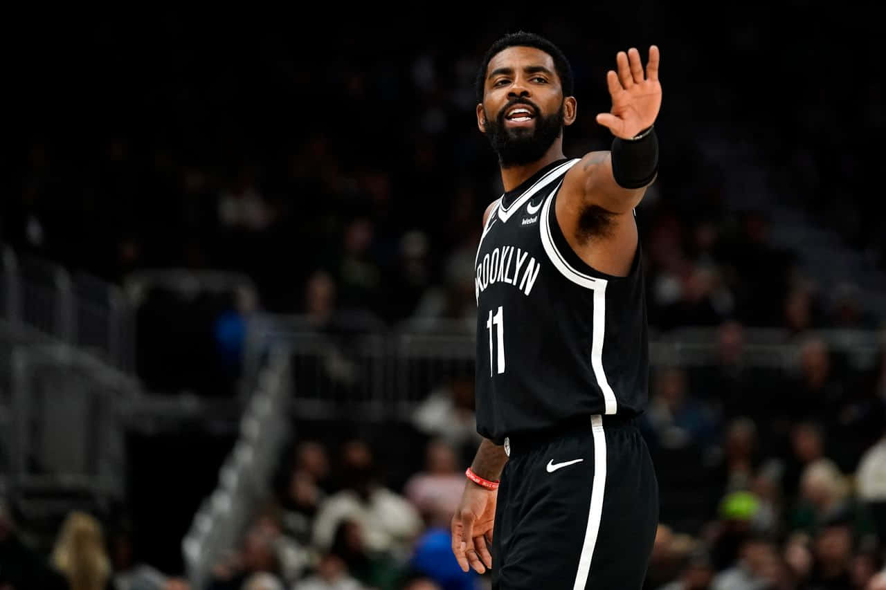 The Brooklyn Nets Kyrie Irving Ready For Action Wallpaper