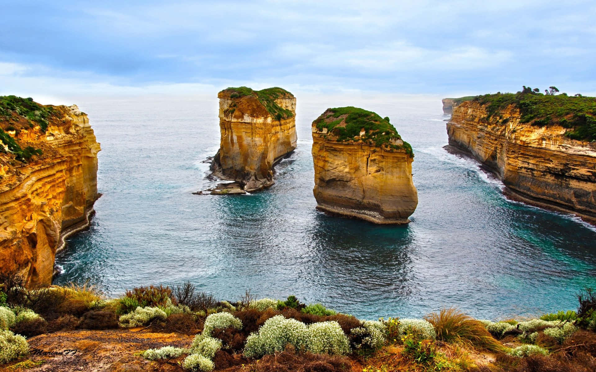 Majestic Of Modest Coastline With Limestone Stacks Wallpaper
