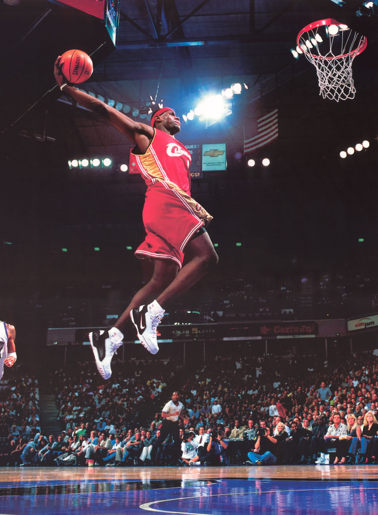 Download Lebron James flying for a slam dunk Wallpaper  Wallpaperscom