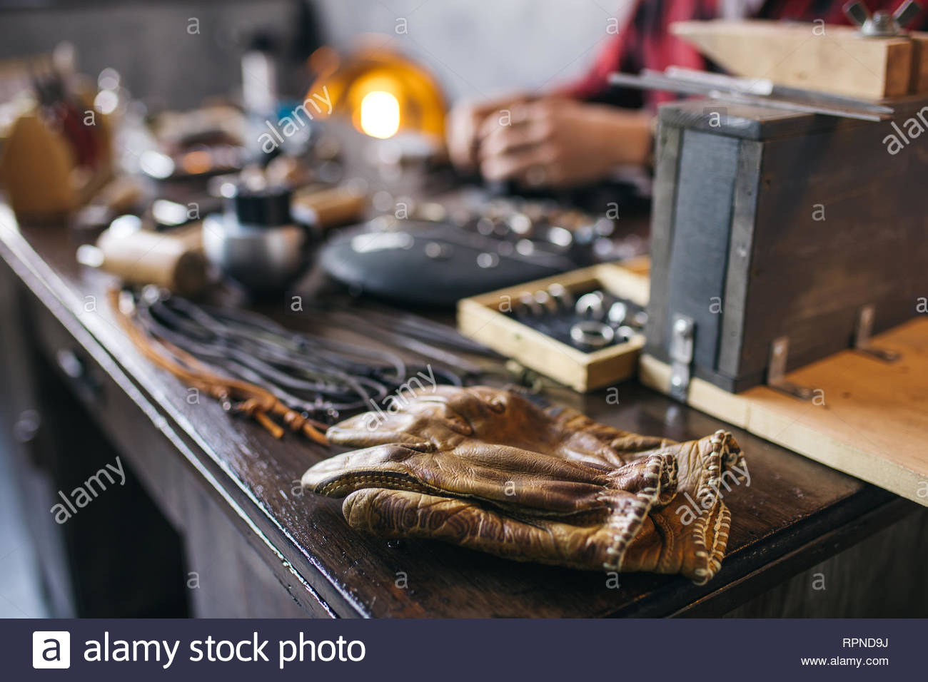 Focus On The Gloves Blurred Image Working Craftsman In