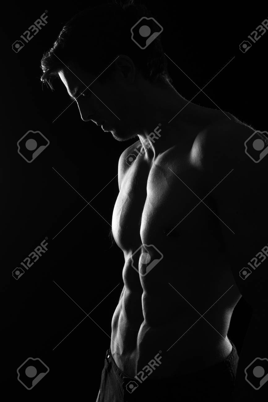 Sexy Shirtless Muscular Male Model On Black Background Stock Photo