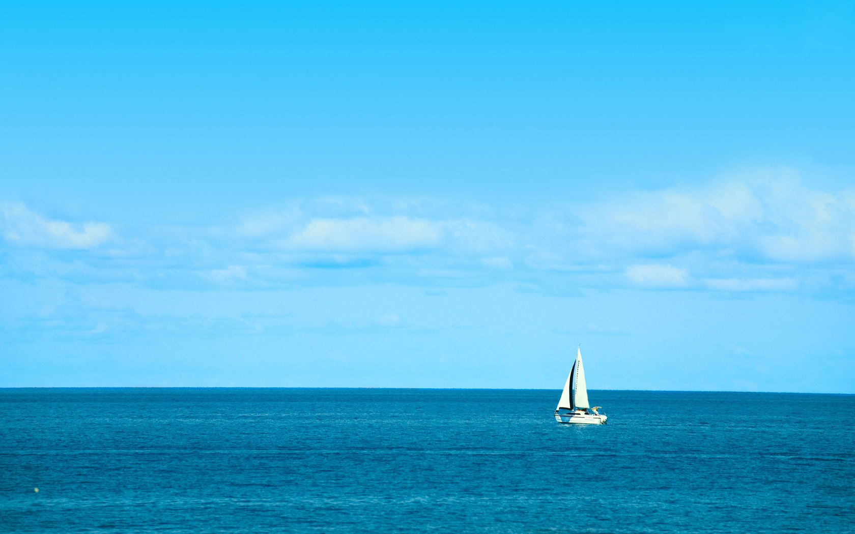 White Sailboat On Blue Ocean Beach Background Wallpaper