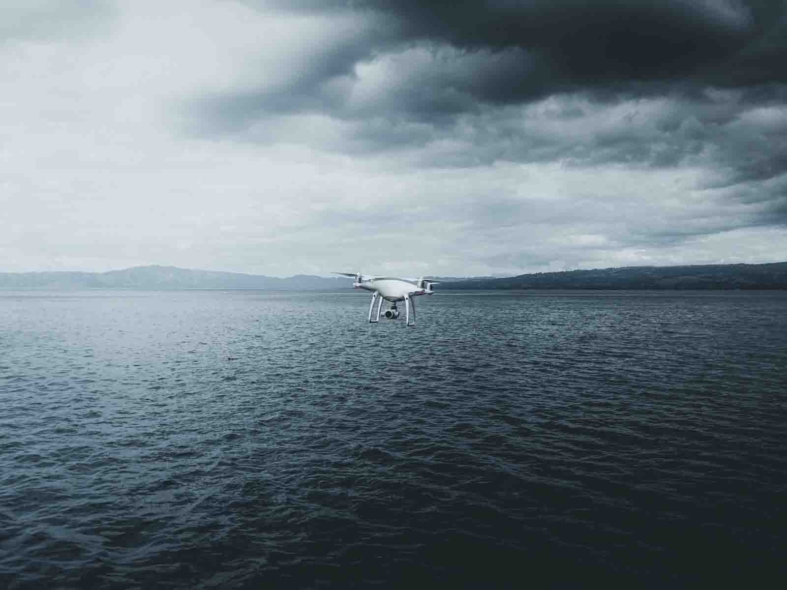 Quadrotor Drone On Ocean Wallpaper HD Stores