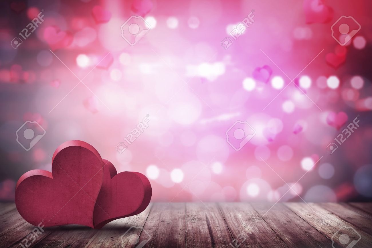 Two Love Shape On The Wooden Floor Over Blur Background Stock