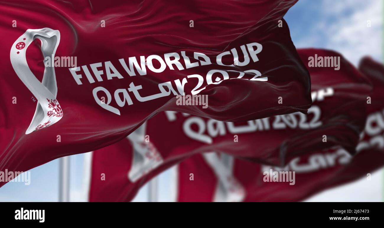 Doha Qatar April 2022 three flags with the Qatar 2022 Fifa