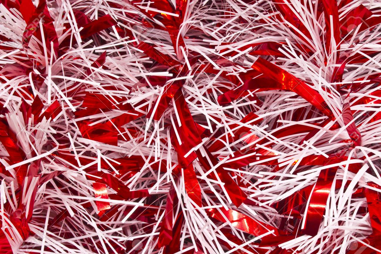 Red And White Christmas Tinsel For Wallpaper Or Background Stock