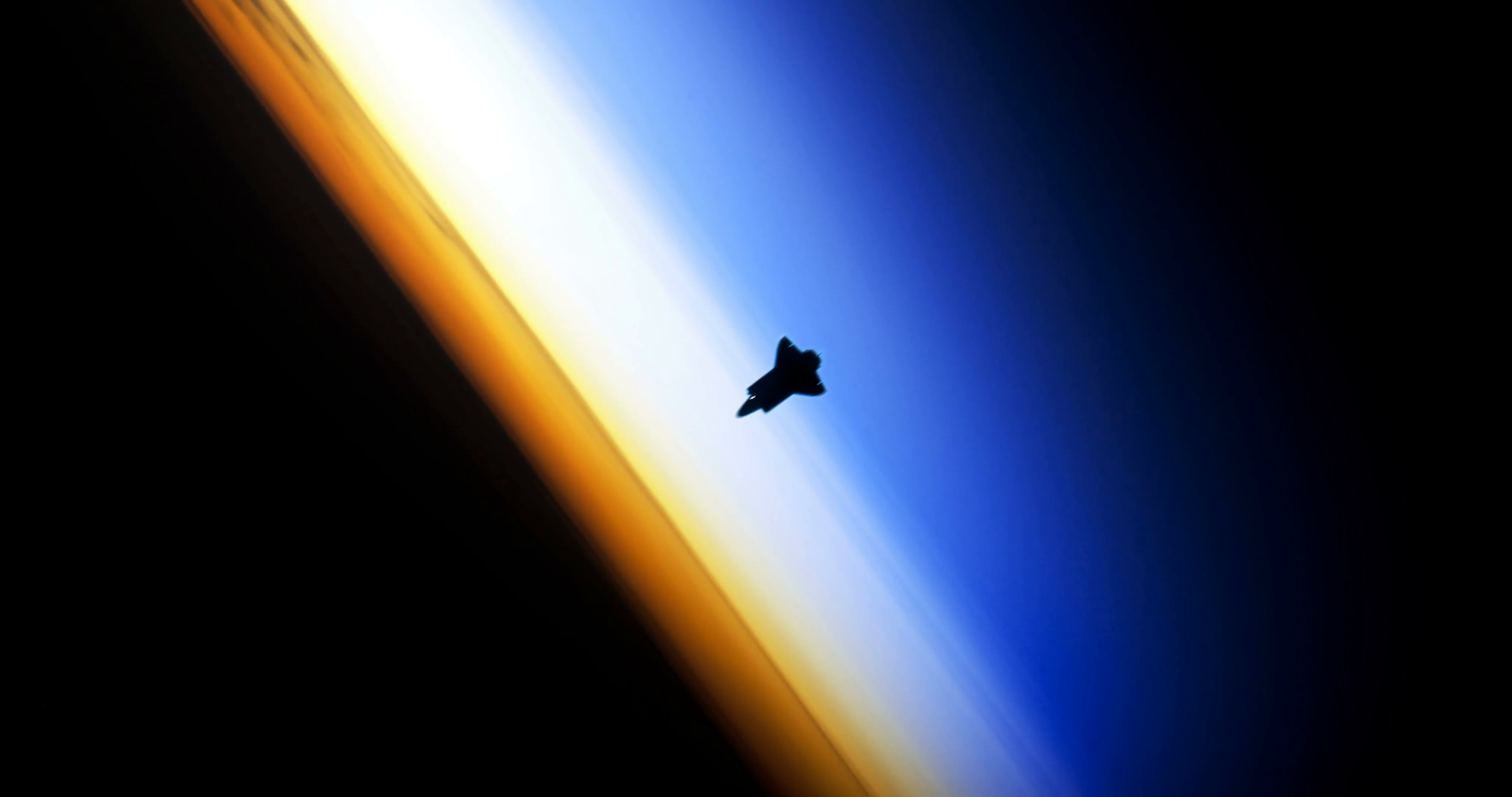 Space Shuttle Silhouette with Sun in Background 4K Motion