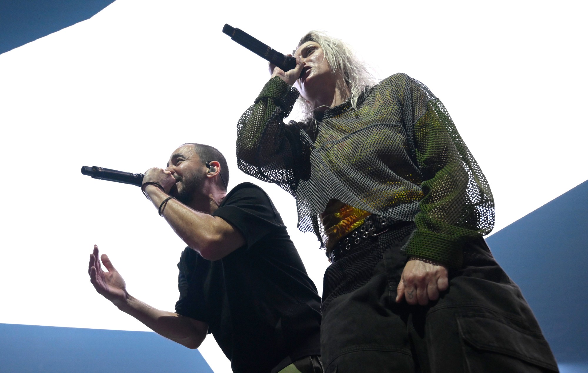Emily Armstrong and Mike Shinoda performing live on stage