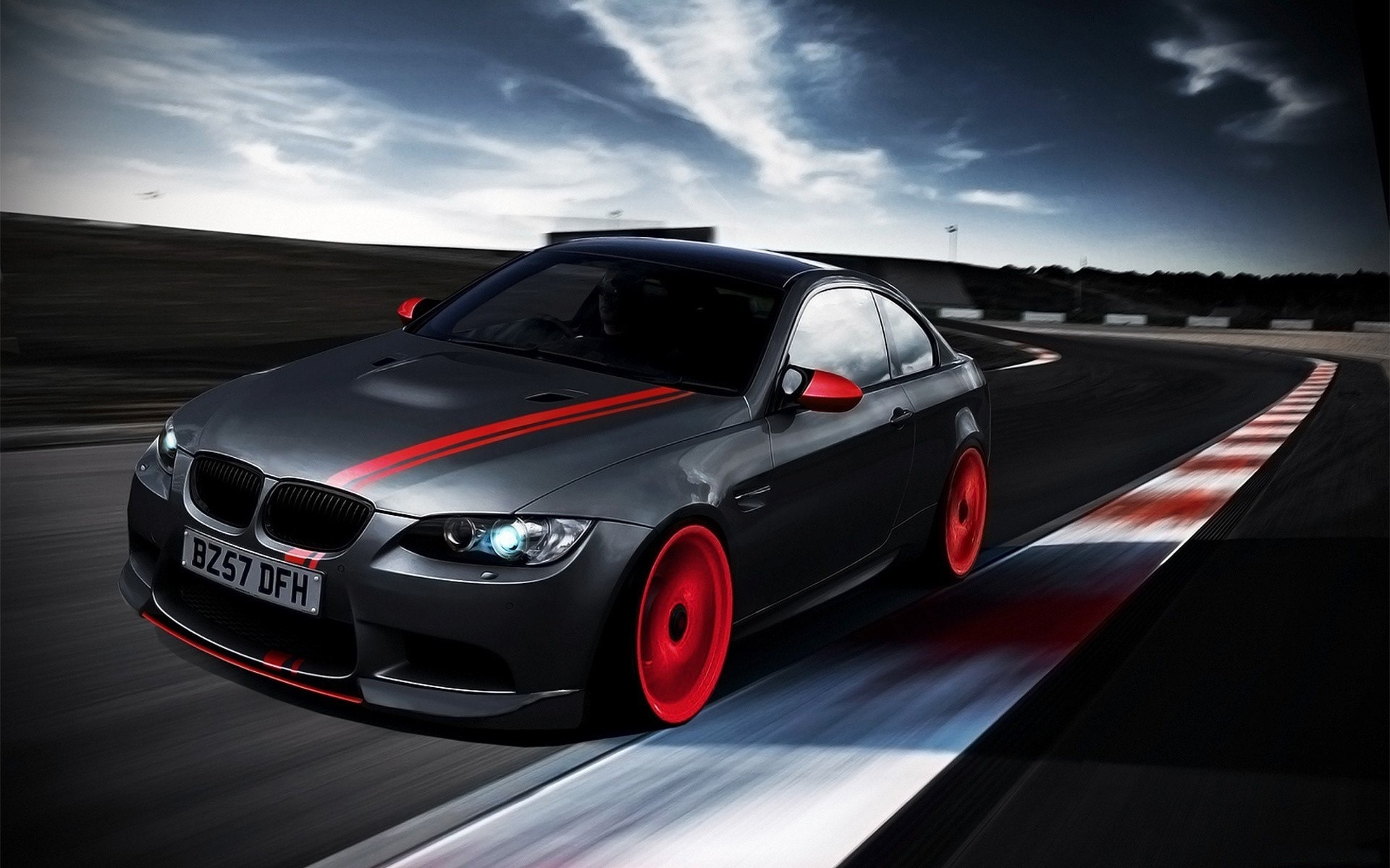 A Customized BMW M3 Coupe Speeding on a Racetrack