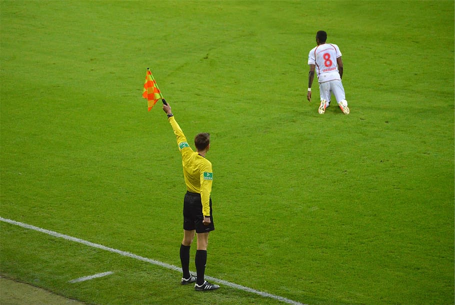 HD Wallpaper Soccer Referee Raising Yellow Flag Holding Orange