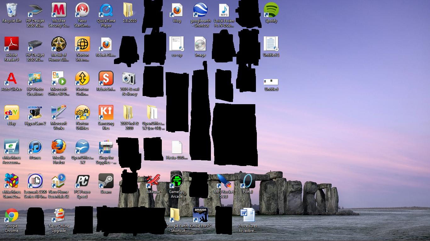 A cluttered Windows desktop with icons for various programs and games, humorously juxtaposed against a serene background image of Stonehenge
