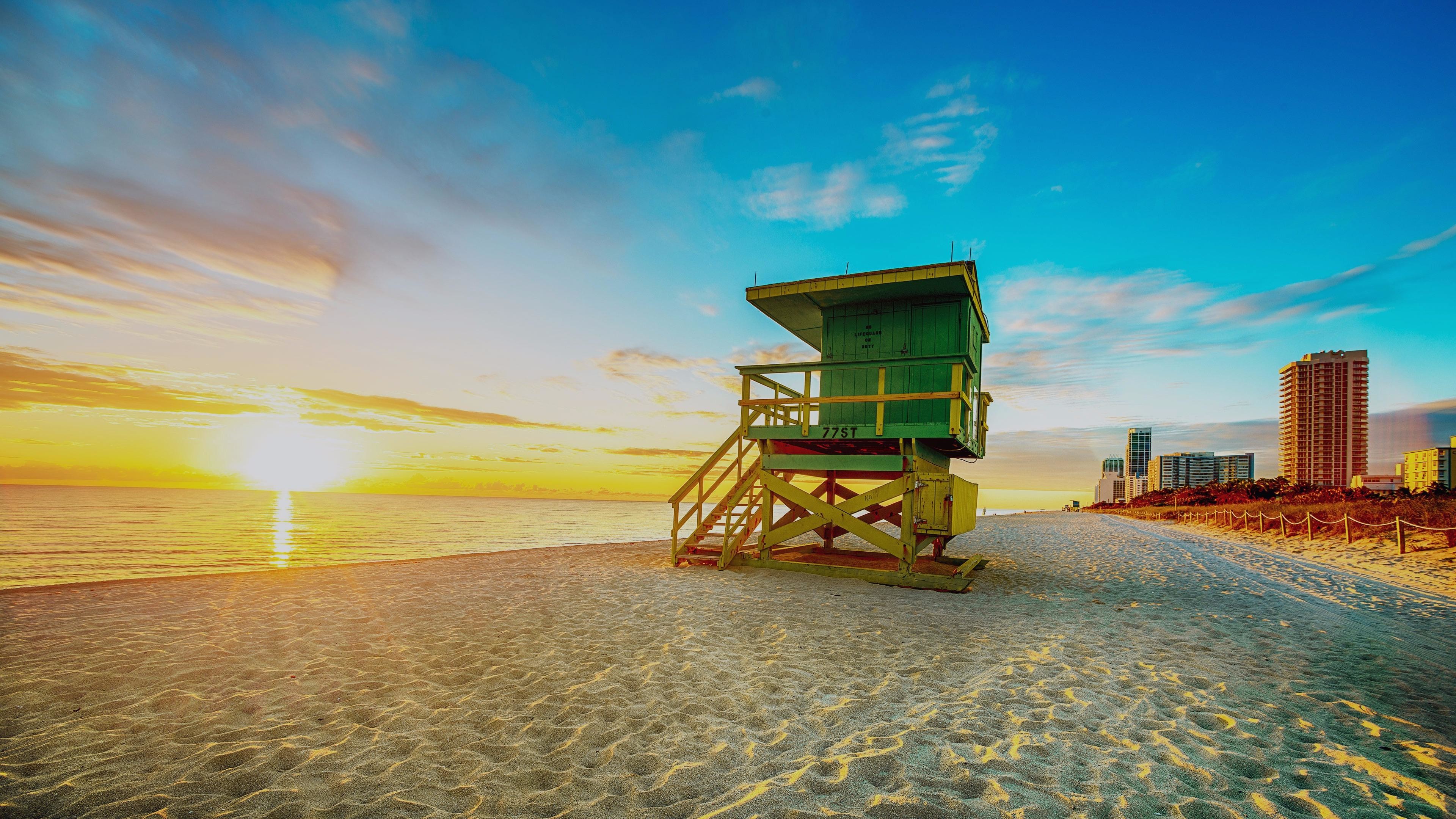 Sunrise over Miami Beach with a lifeguard stand in the foreground