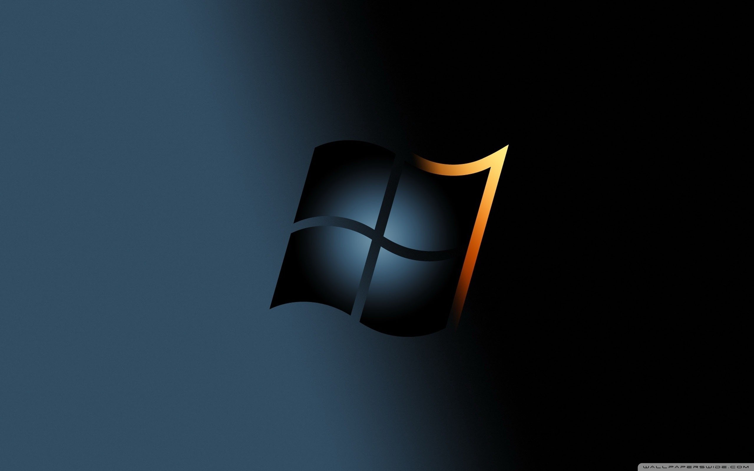 Windows 7 logo on a dark background