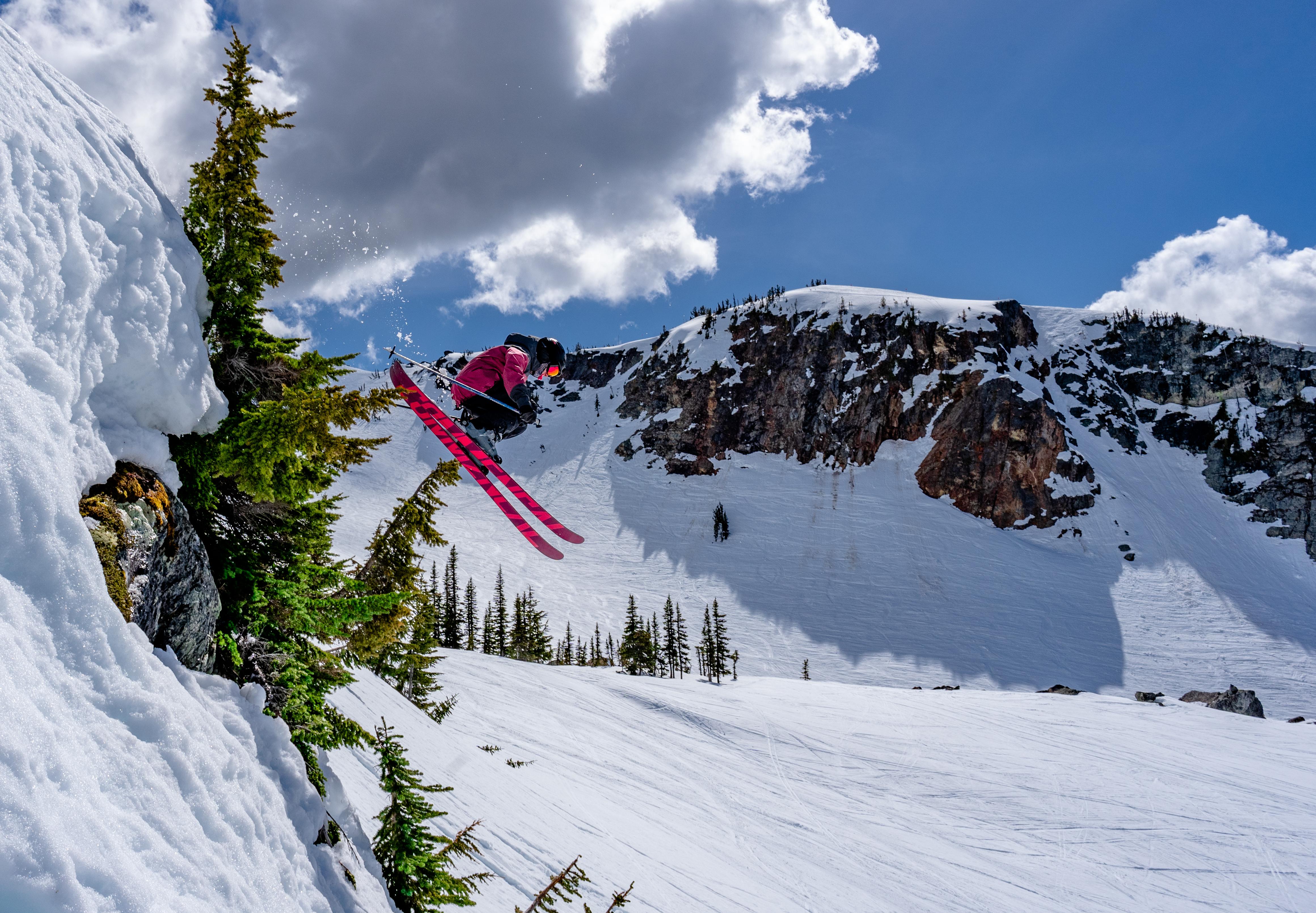 Ryder Dropping Over Some Trees At Whistler West Ridge In The