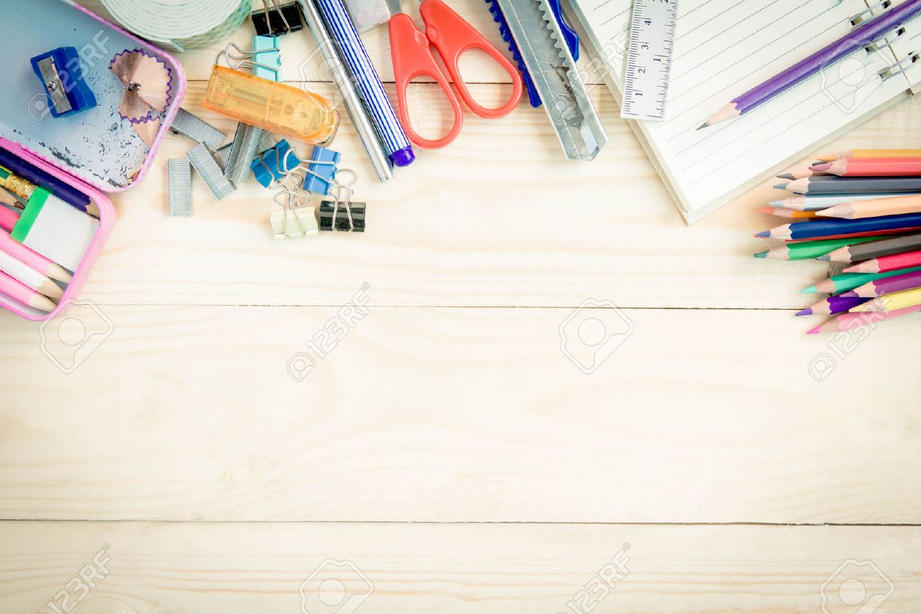 School And Office Supplies On Wood Background Back To