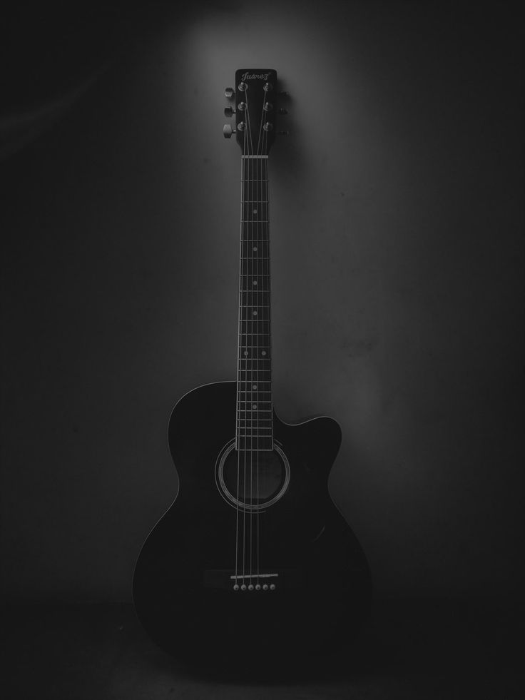 Black and white acoustics guitar I love photography so I click