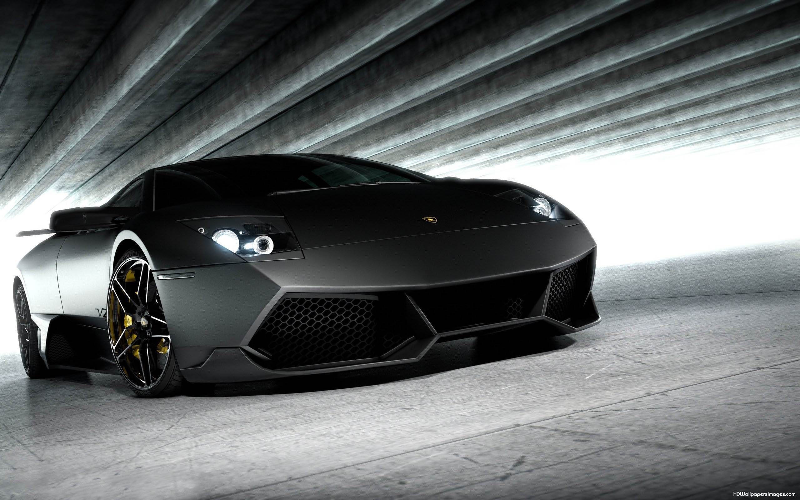 Sleek Black Lamborghini Murciélago in a Concrete Tunnel
