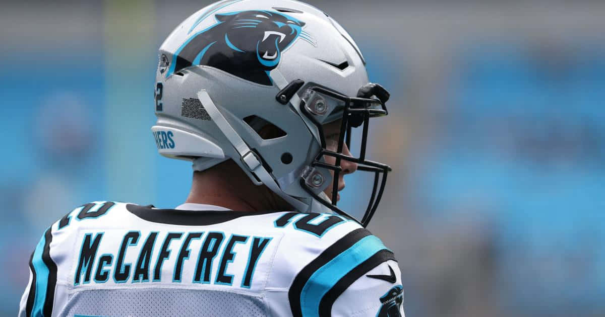 Christian Mccaffrey Playing Football As A Running Back For The Wallpaper