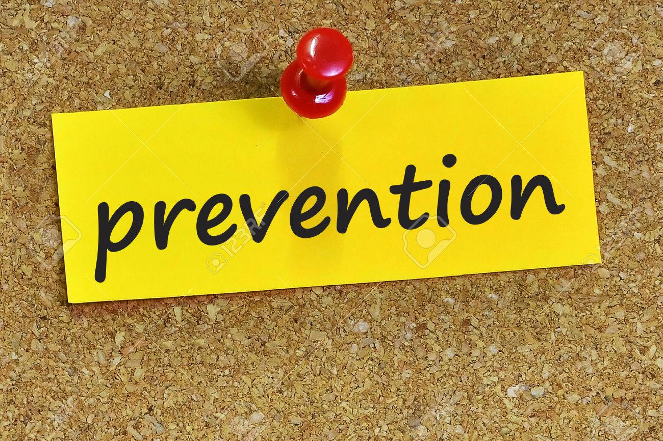 Prevention Word On Yellow Notepaper With Cork Background Stock