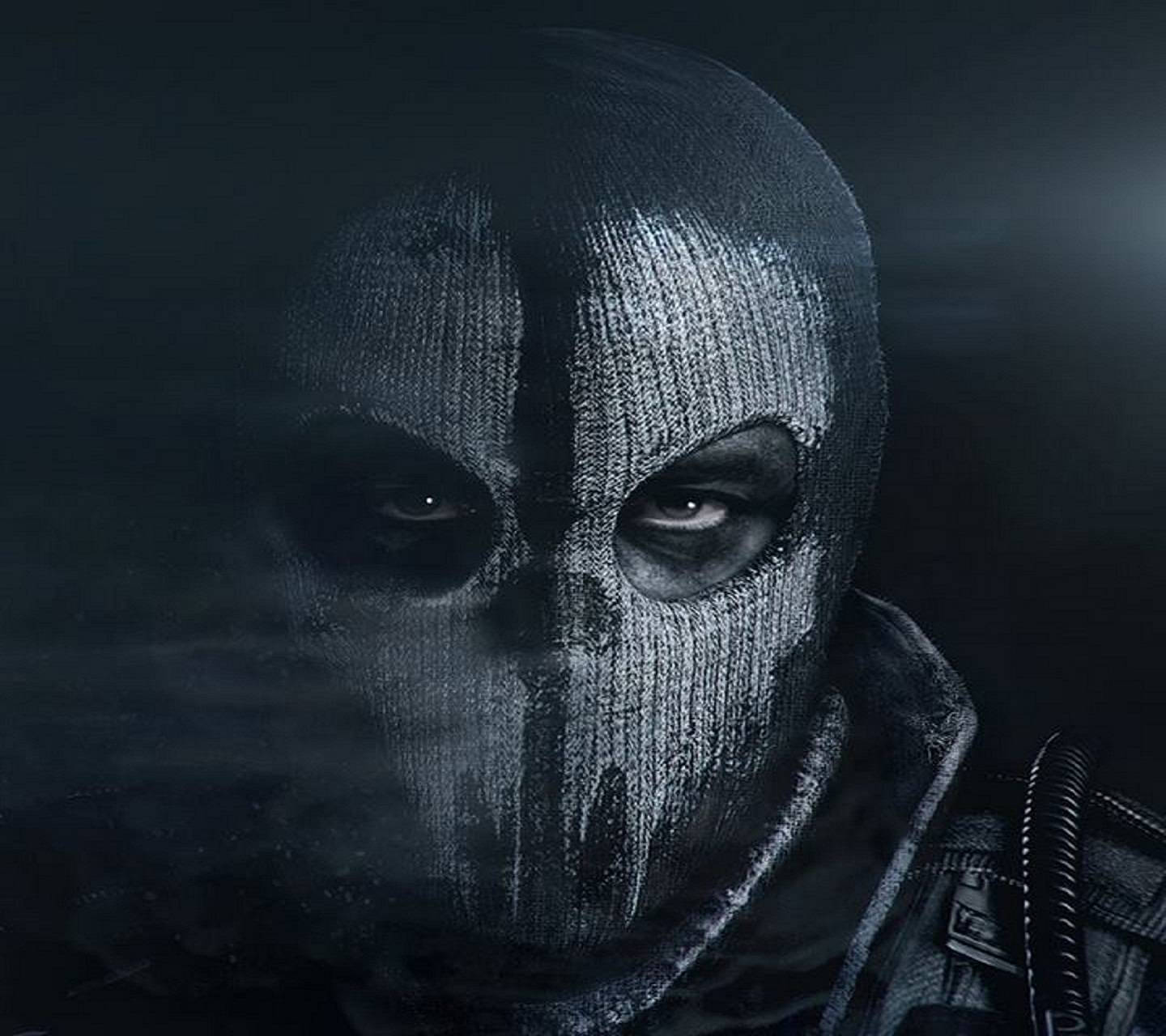 A Man In Mask Is Standing The Dark Wallpaper