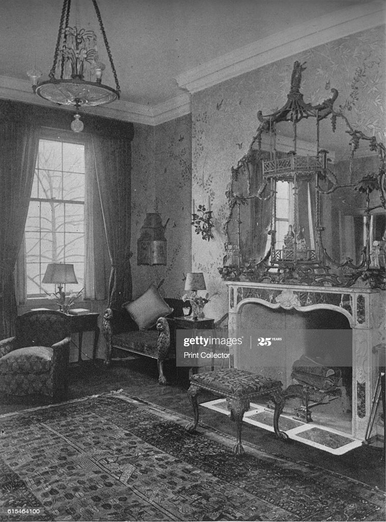 Reception Room With Chinese Chippendale Wallpaper And Mirror
