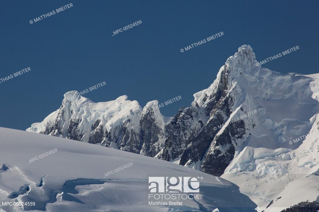 Glacier Covered Melchior Islands With Peaks Of Brabant Island In
