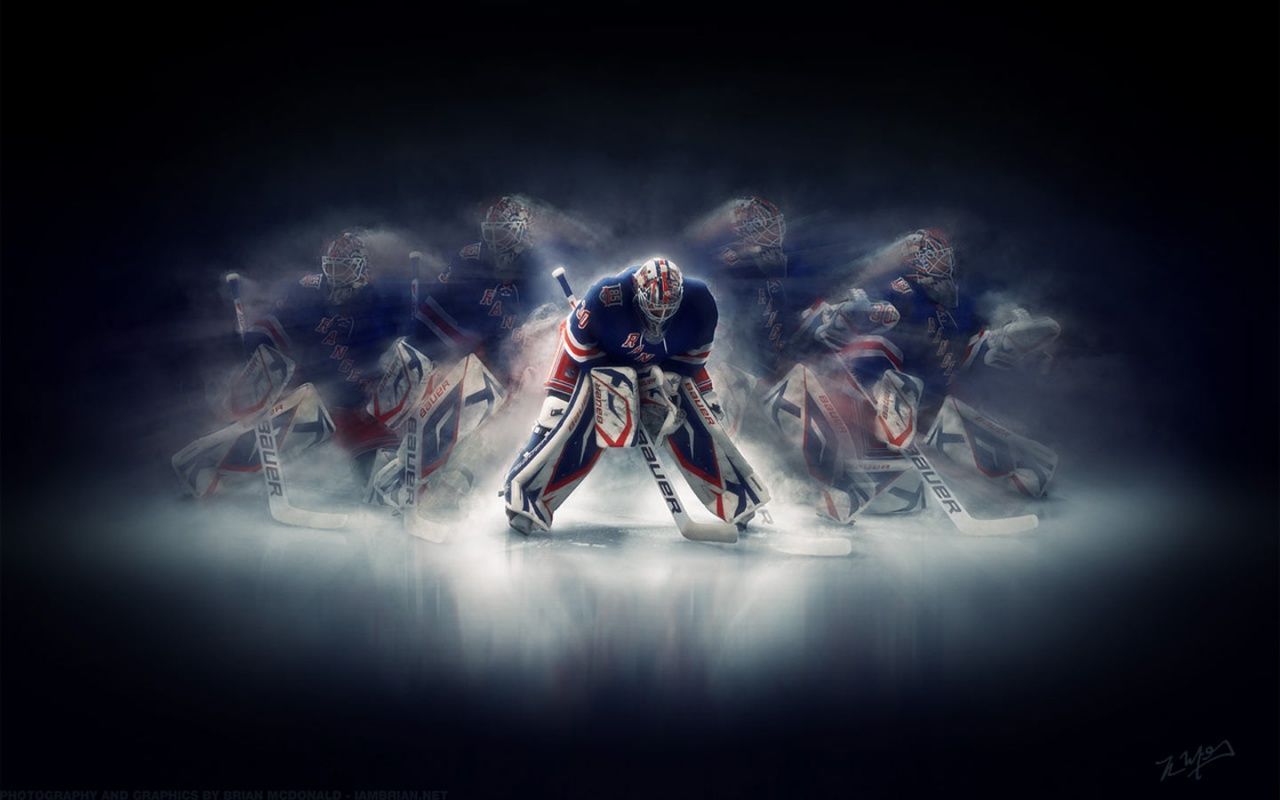 New York Rangers goalie in action, making a save on the ice. Hockey wallpaper