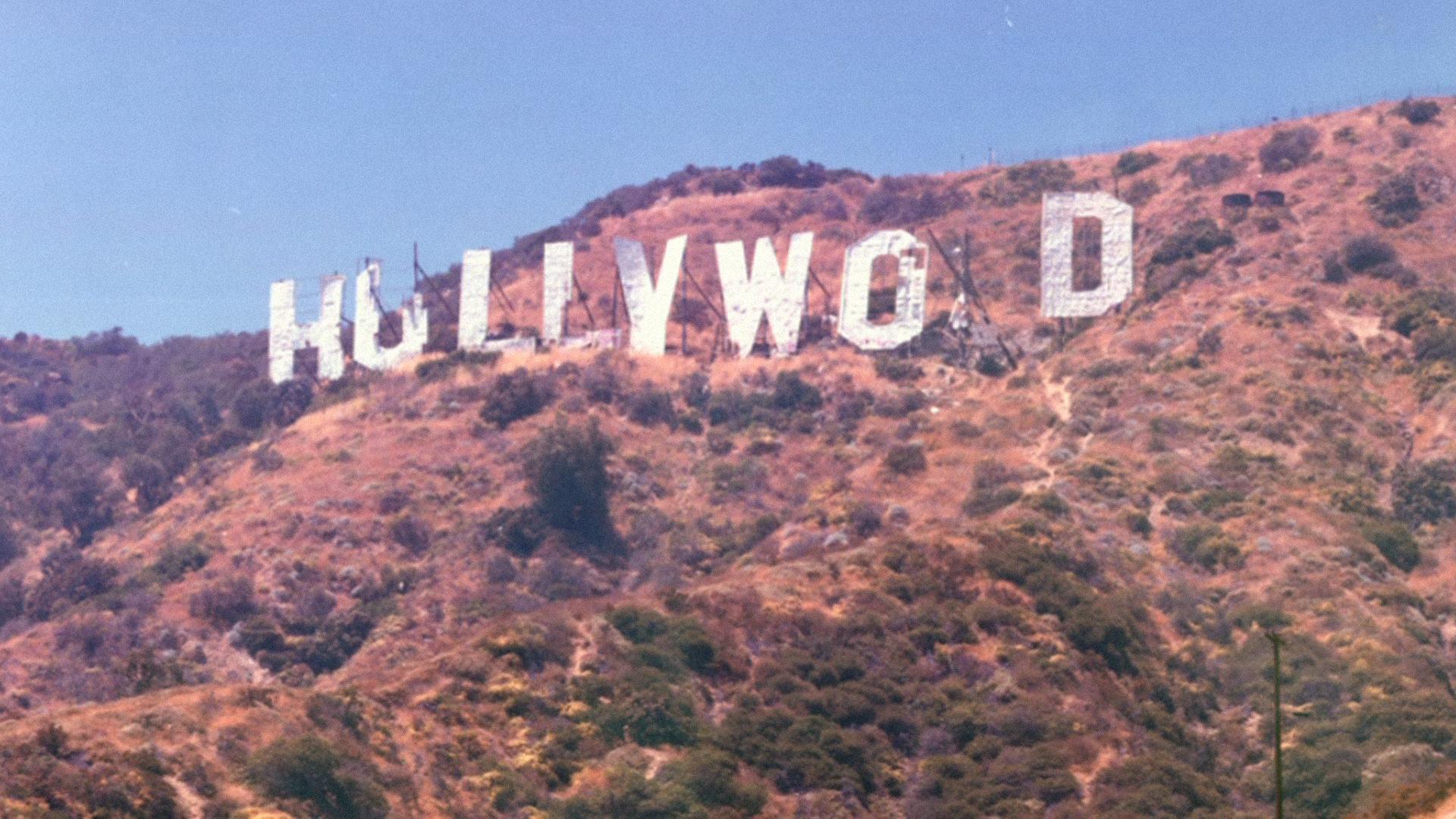 Hollywood Sign Falling Apart In The 70s Wallpaper
