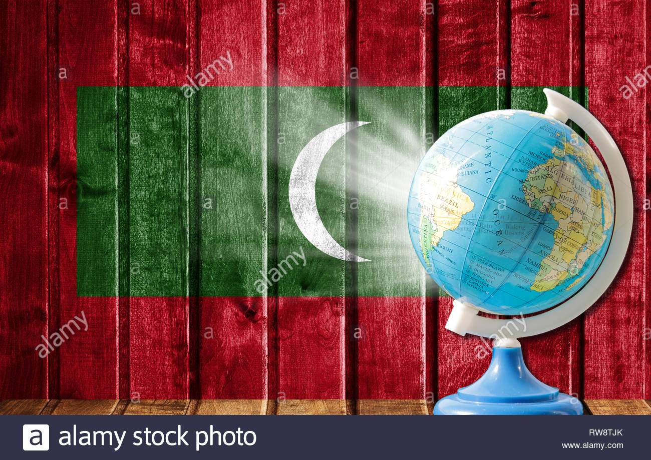 Globe With A World Map On Wooden Background The Image Of