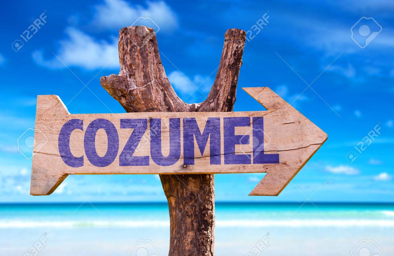 Cozumel Sign With Arrow On Beach Background Stock Photo Picture
