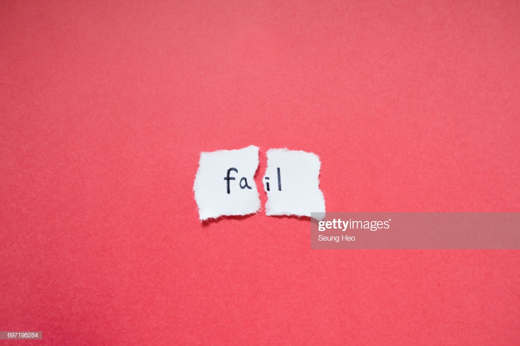 Text Fail On Torn Paper Background Stock Photo Getty Image
