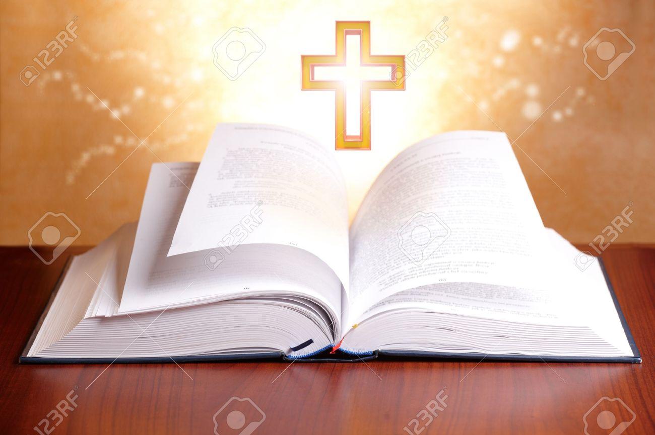 Open Holy Bible With Peaceful Light And Cross Stock Photo Picture