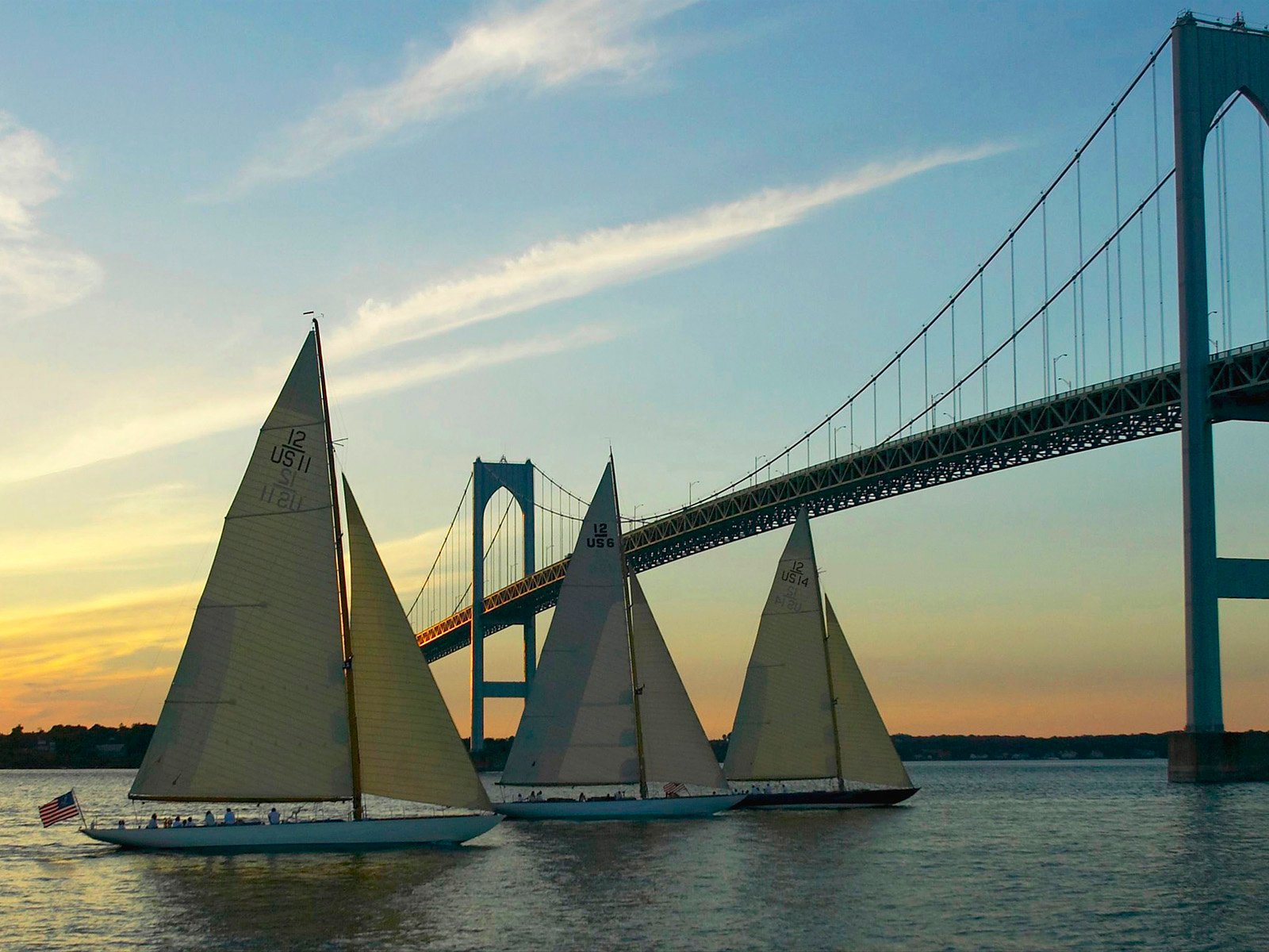 Yachts Sailing Under the Newport Bridge at Sunset Rhode Island