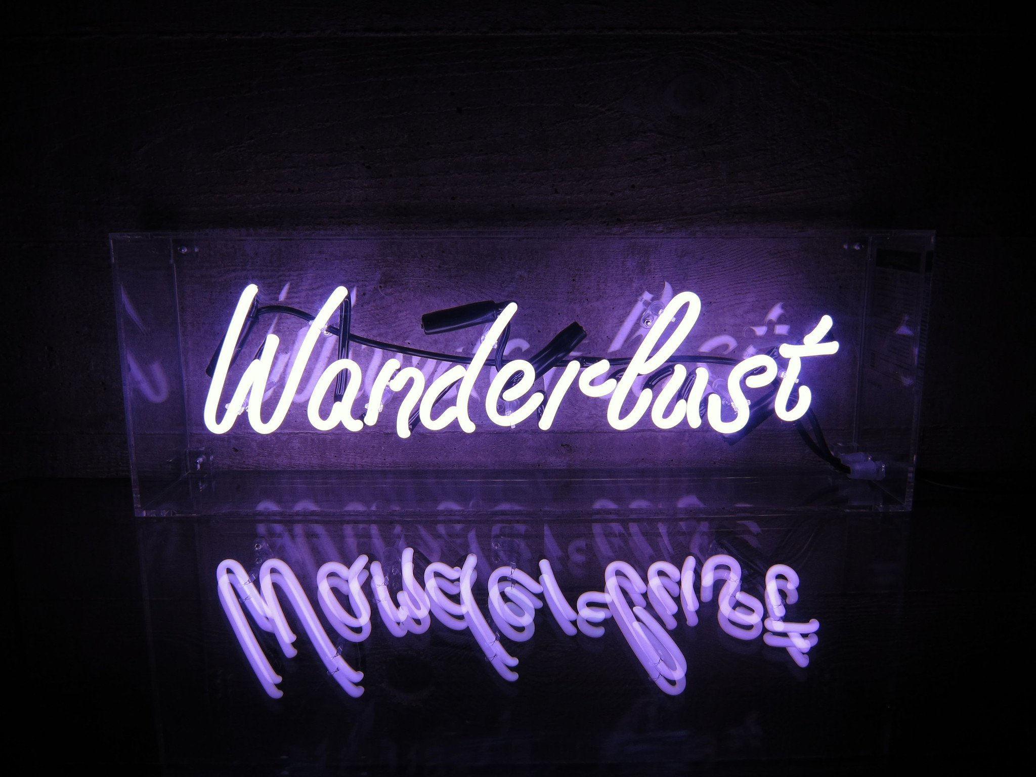 Wanderlust Neon Sign Wallpaper