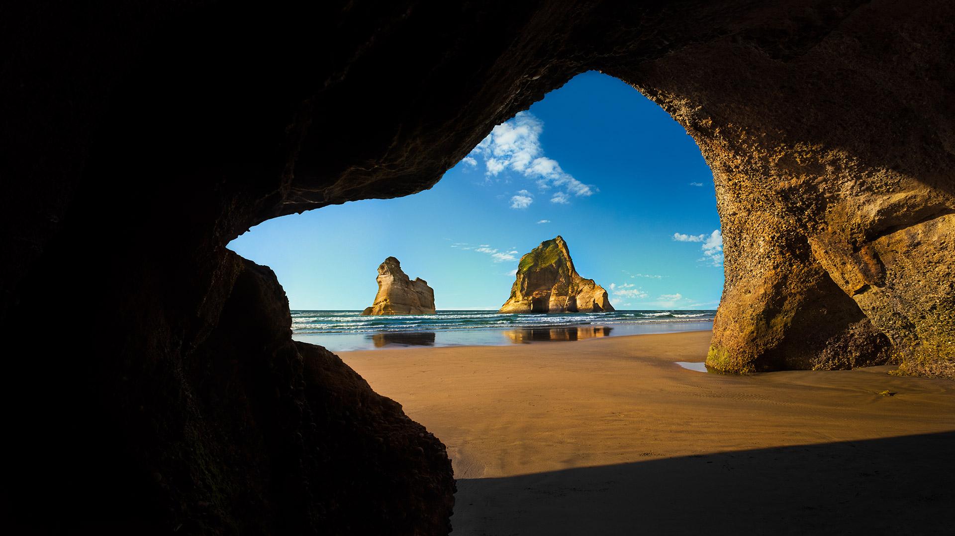 Wharariki Beach Cave Archway Islands South Island Of New Zealand