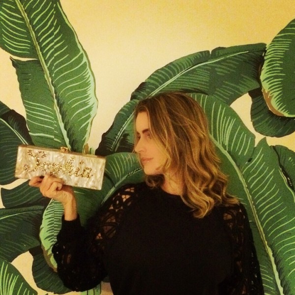 Against the world famous palm printed wallpaper wearing a Chloe