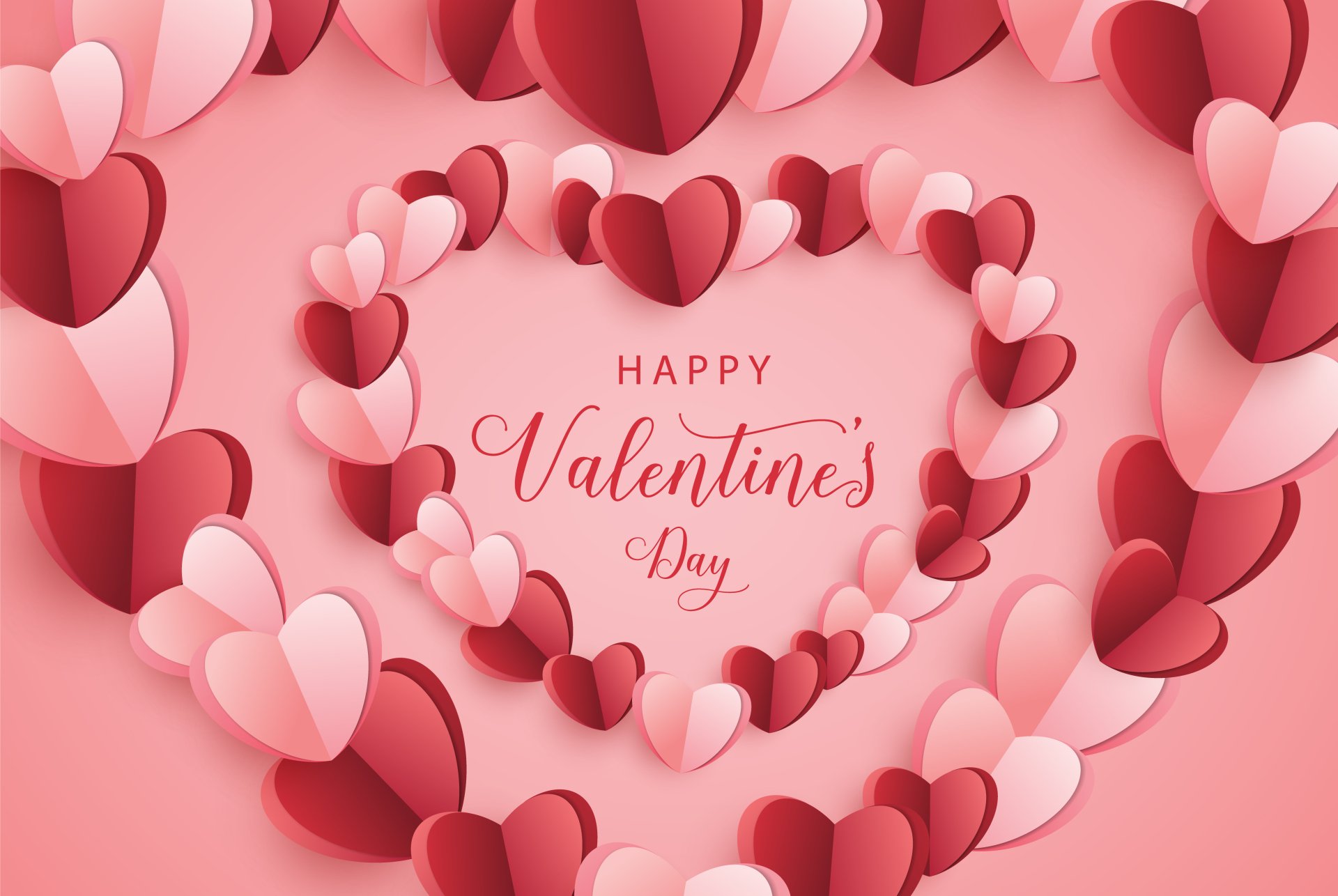 Happy Valentine's Day greeting card with a 3D heart-shaped frame made of pink and red paper hearts on a pink background