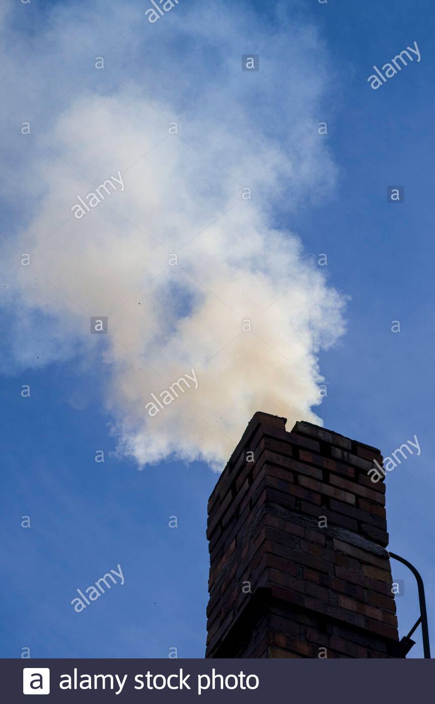 Free download billowing smoke coming out of chimney of house on blue