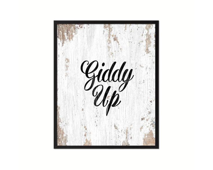 A White And Black Sign That Says Giddy Up Wallpaper
